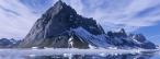 Titelbild Schneeberge spiegeln sich im Wasser Titelbild Schneeberge spiegeln sich im Wasser